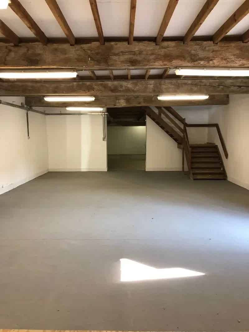 Magazijn deeluitmakende van vierkantshoeve Hof ter Poorten te Althoeselt, met een totale oppervlakte van 445 m²