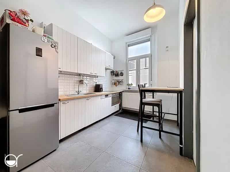 Rijwoning met terras en 3 slaapkamers