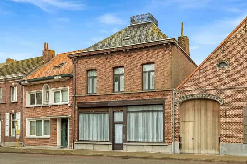 Charmant, te renoveren pand met authentieke elementen en zuid-tuin in centrum Zandvliet