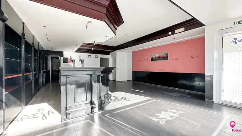 Ruim handelspand met garage in het centrum van Beringen!