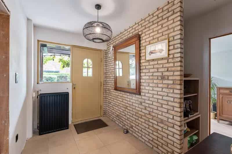 Rustig gelegen woning met ruime tuin en garage