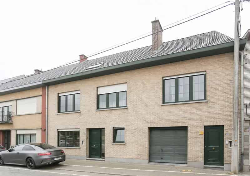 Woning met tuin + appartement centrum Lebbeke!
