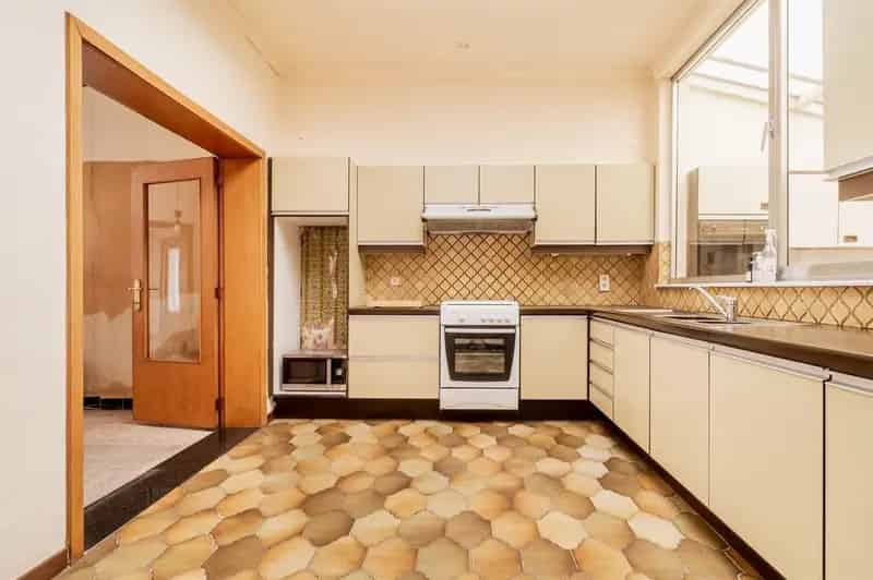 Te renoveren herenhuis aan de Dijle