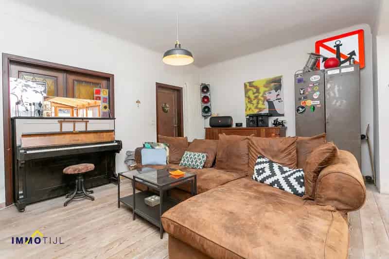 Woning met achterliggende opslagplaats te Walem